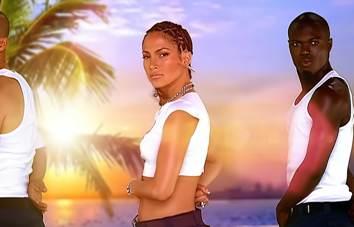 three people dancing against a tropical backdrop.