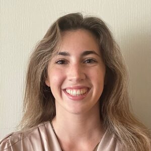 photo of a smiling young woman with long blond hair