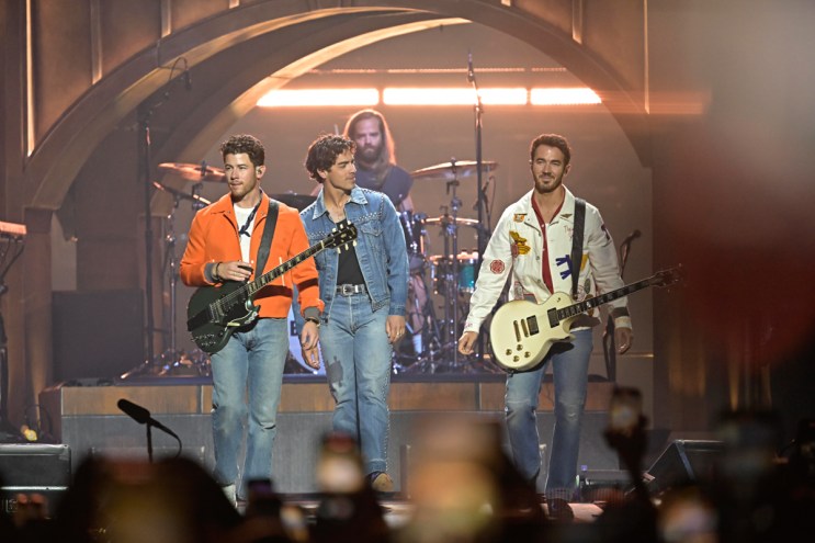Jonas Brothers perform on stage during the JONAS20: Greetings from Your Hometown Tour at Amerant Bank Arena on Oct. 24, 2025 in Sunrise, Florida.