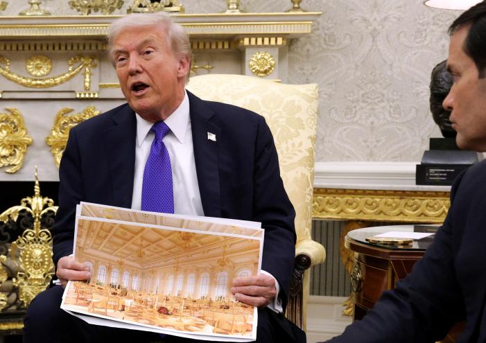 Trump holds a photo rendering of the White House State Ballroom