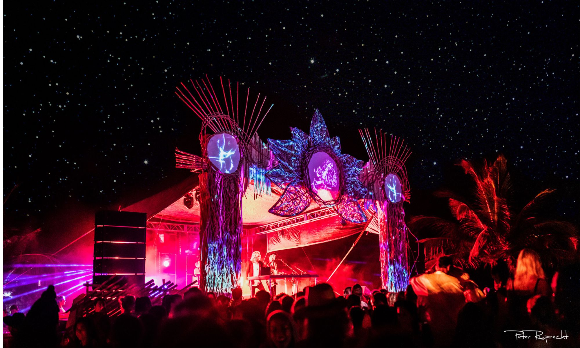 Photo of a stage at an electronic festival.