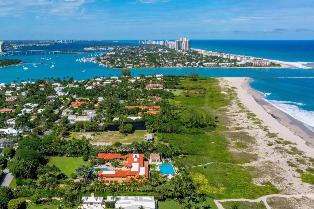 the estate's massive footprint is seen from above, showing its proximity to the beach