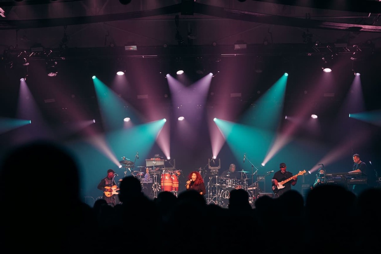 Picture of a band performing on stage.