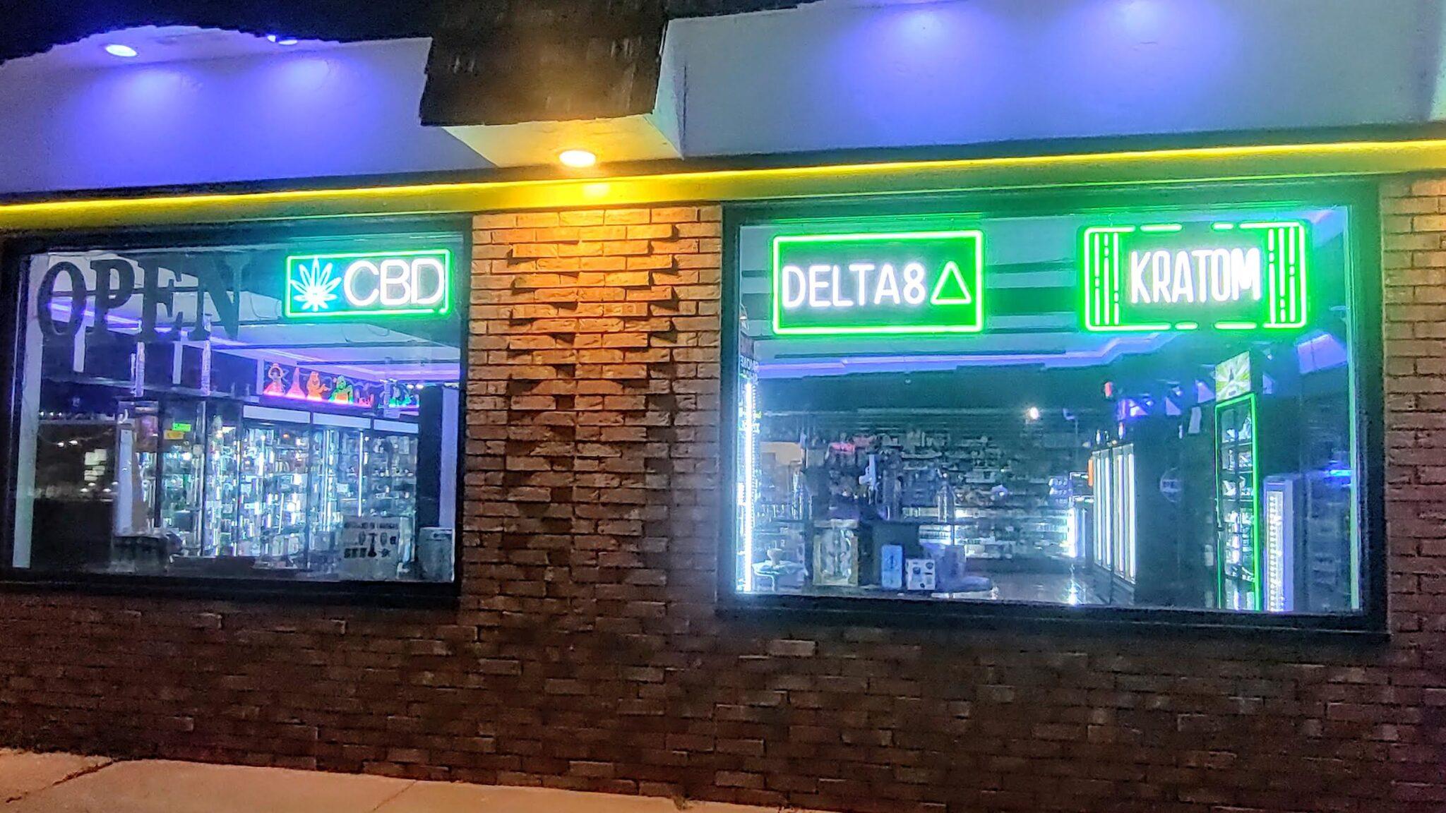 nighttime color photo of the neon-lit exterior of a hemp store in Tallahassee, Florida