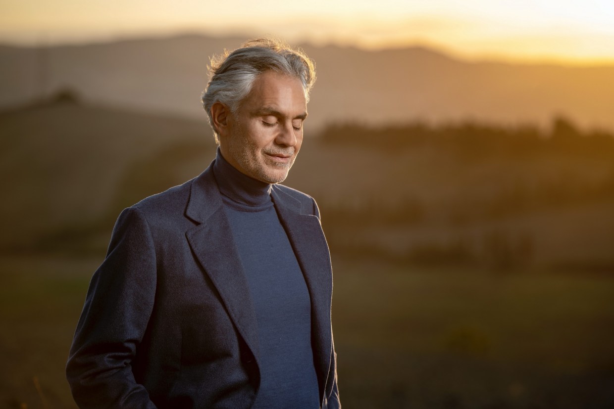 photo of singer Andrea Bocelli in front of a prarie