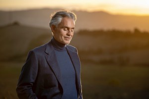 photo of singer Andrea Bocelli in front of a prarie