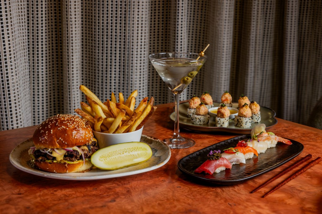 an assortment of food on a wood table