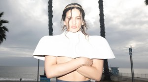 Photo of a woman wearing a white top .