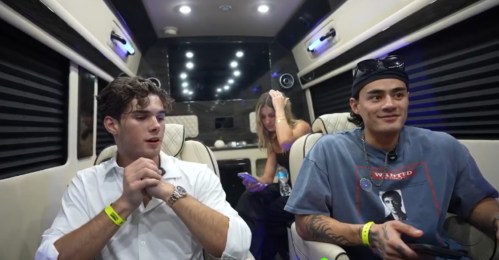 Far-Right Streamer Flaunts Racist Sign at Miami Club