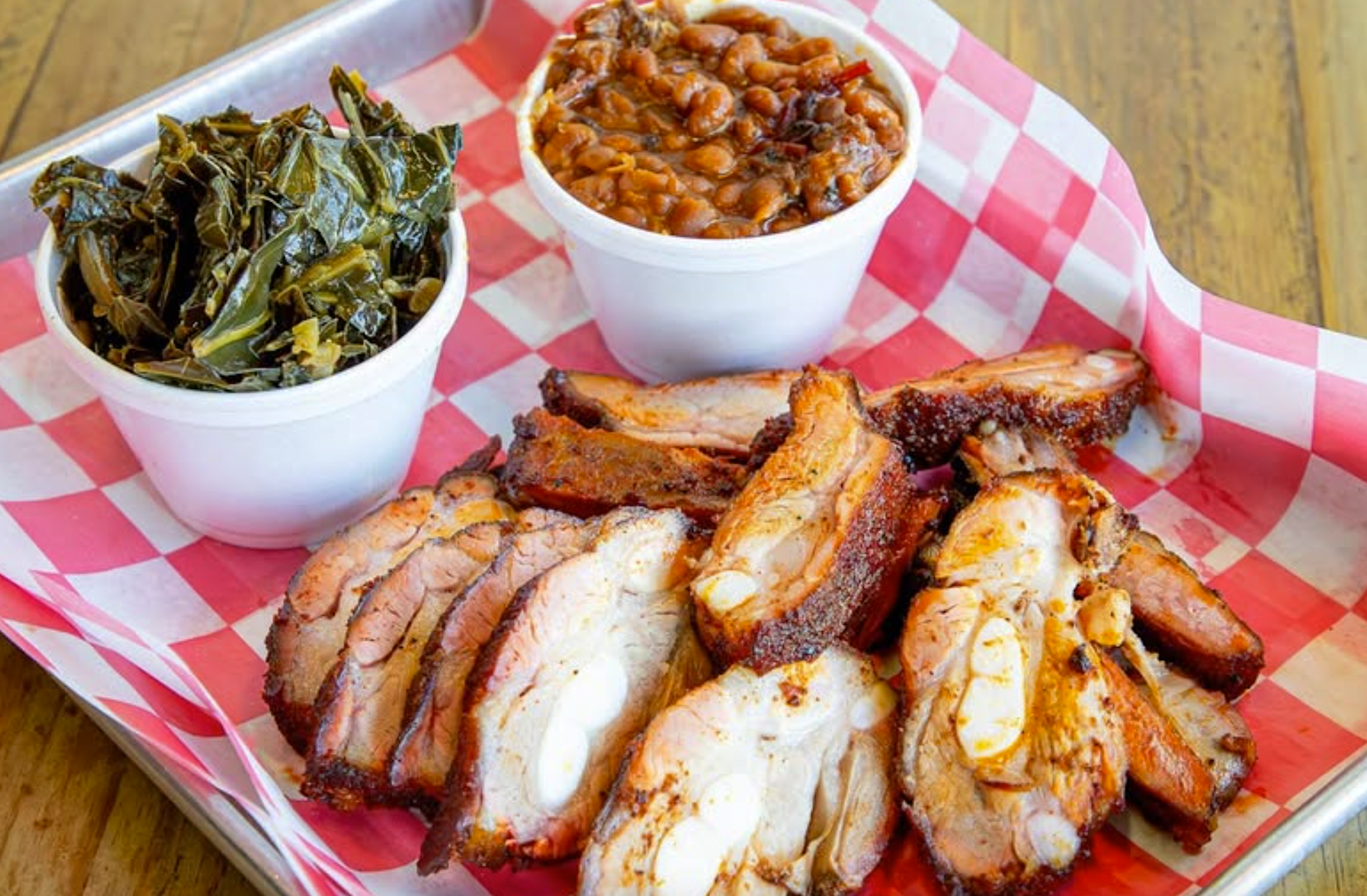 barbeuce platter with collard greens and baked beans