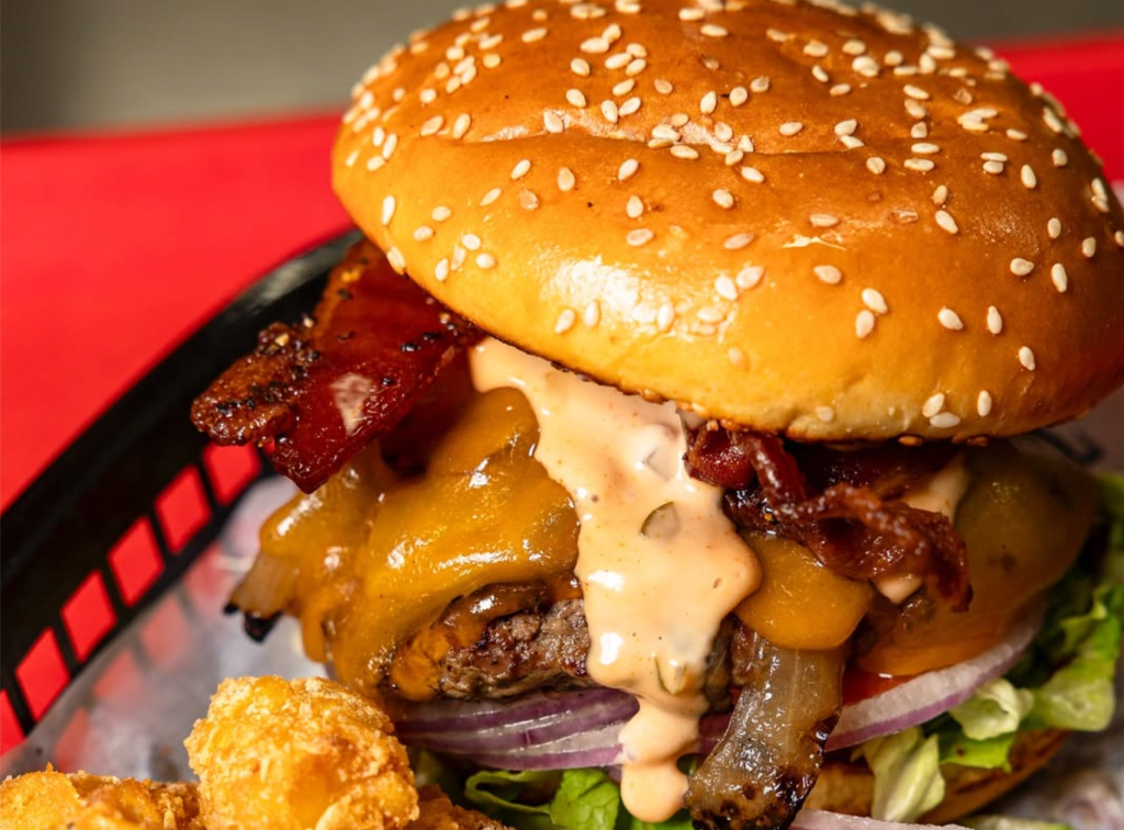 Cheeseburger with bacon and sauce at Charm City Burger Company in Boca Raton