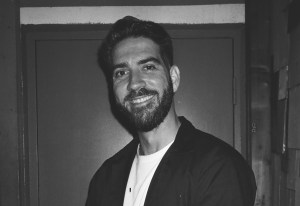 black-and-white portrait of comedian Sergio Mendez