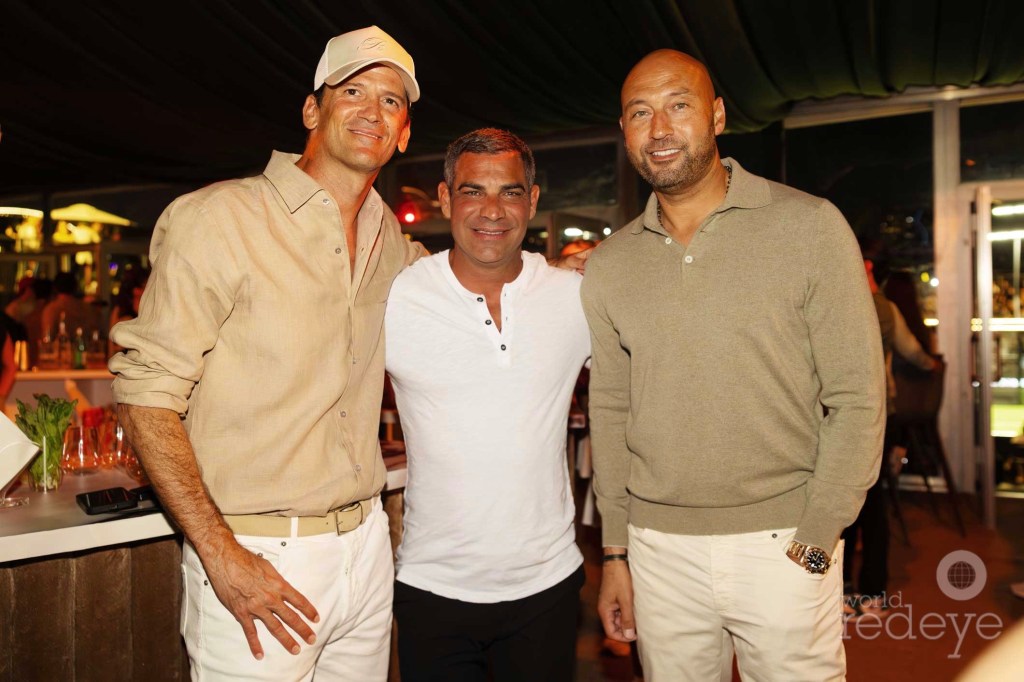 photo of Wayne Boich, Francis Suarez, and Derek Jeter posing together