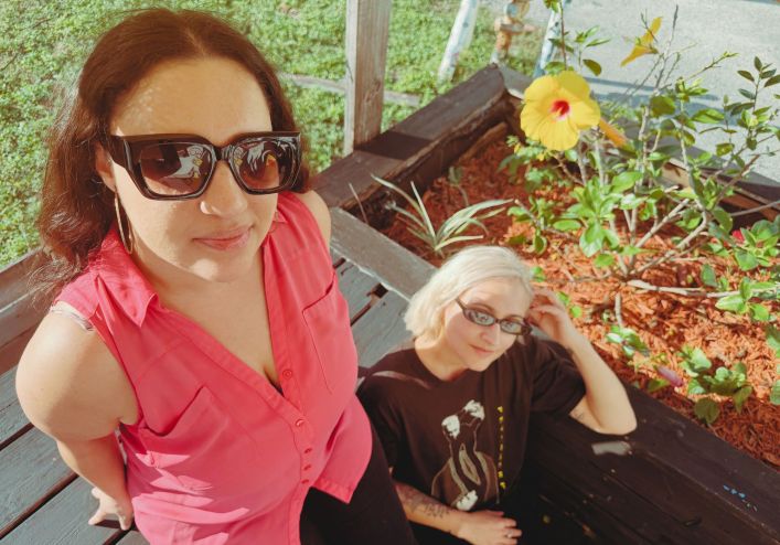 Photo of two women in a garden