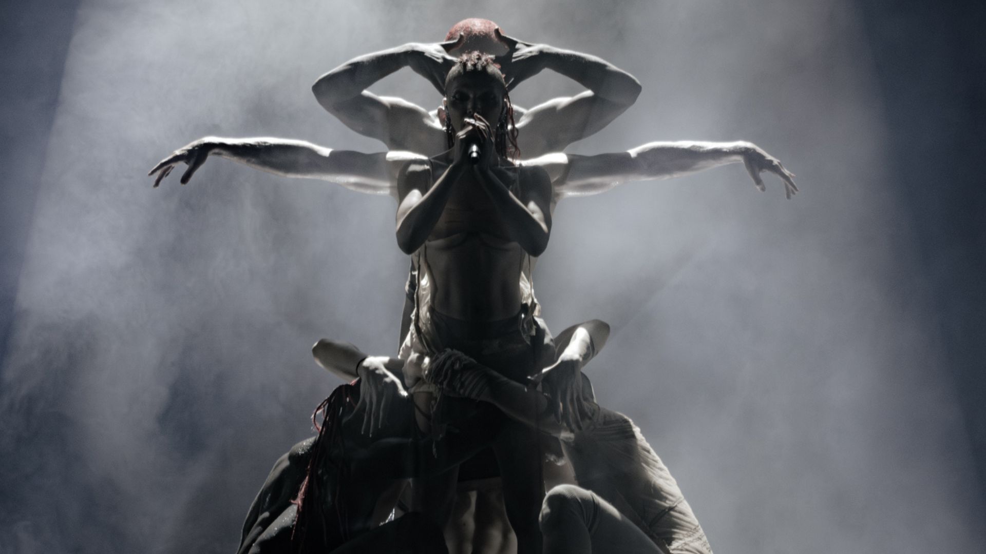Photo of FKA Twigs and her dancers performing on stage in Miami