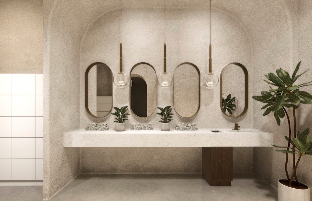 rendering of a pastel bathroom showing a counter, four oval mirrors, and a plant on the right