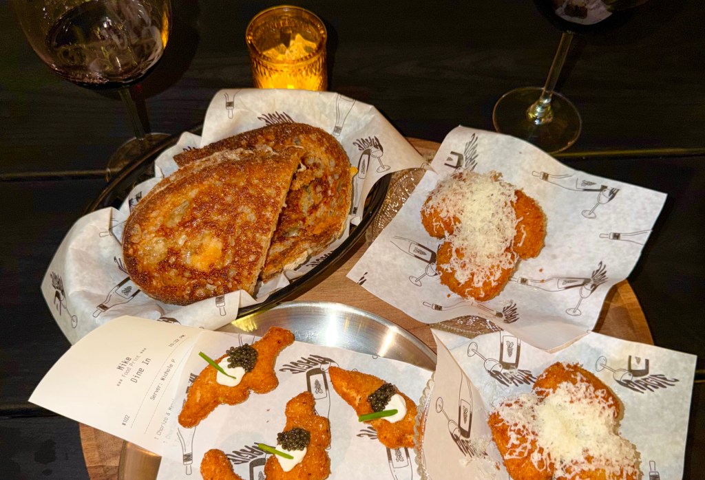 appetizers from Magie Wine Bar include delicious chicken nuggets with caviar and tons of fried bites