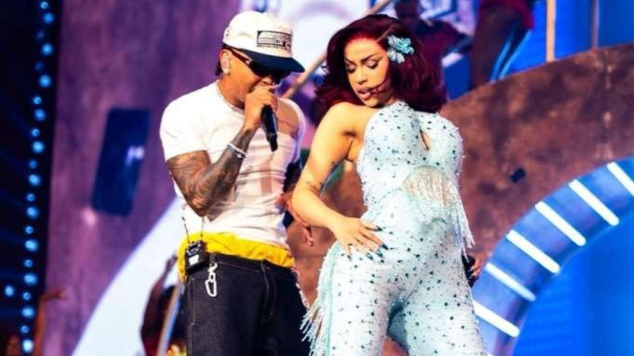 Photo of Ozuna and Cardi B on stage in Miami