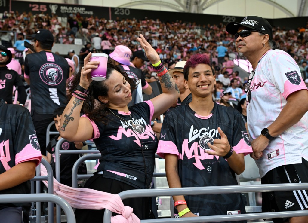 photo of fans dancing in the stands at Nu Stadium on opening day