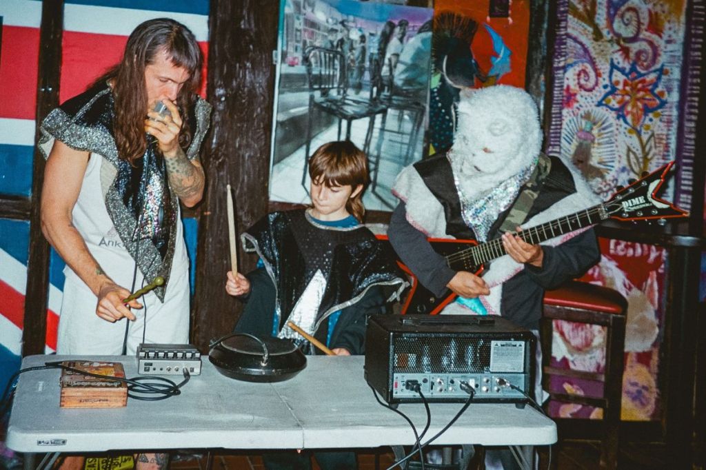 Photo of tow people and a kid performing at Churchill's