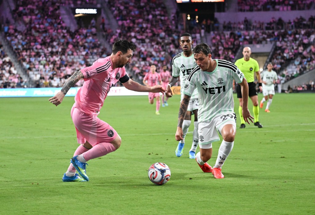 photo of Lionel Messi and Guilherme Biro playing soccer at Nu Stadium