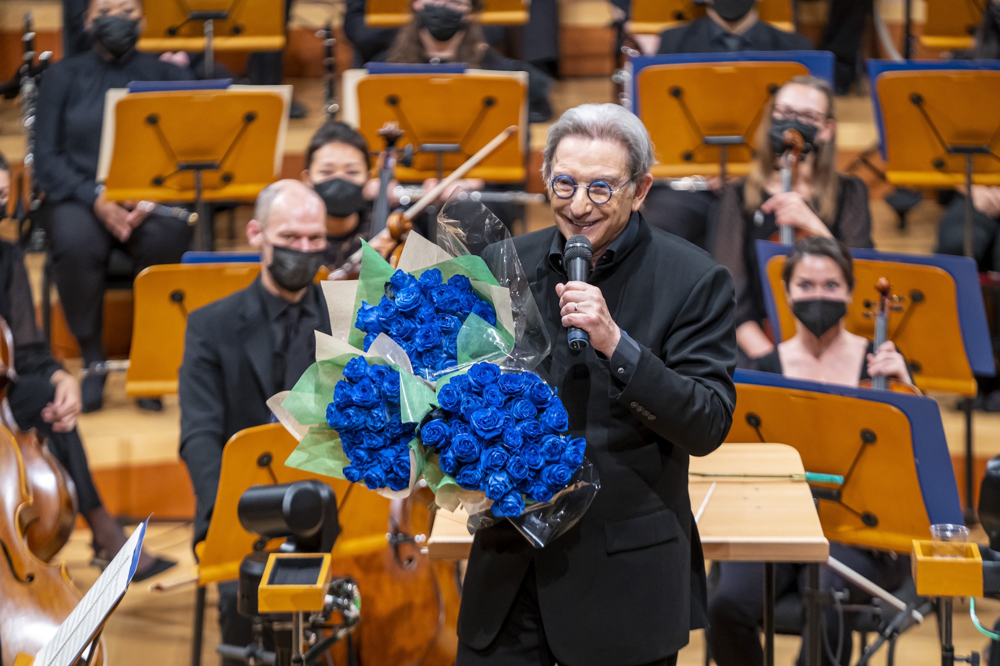 Photo of late conductor Michael Tilson Thomas on stage.