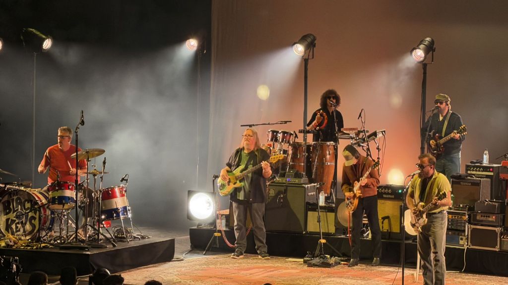 Photo of a five piece rock band performing on stage at the Hard Rock Live in Hollywood, Florida.  