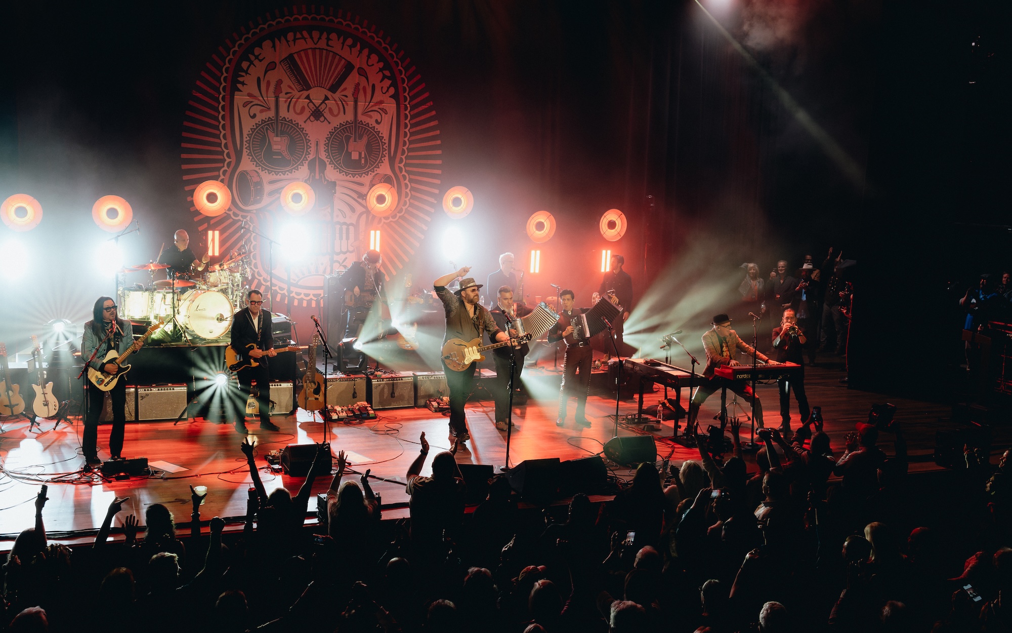 Photo of country band The Mavericks on stage.