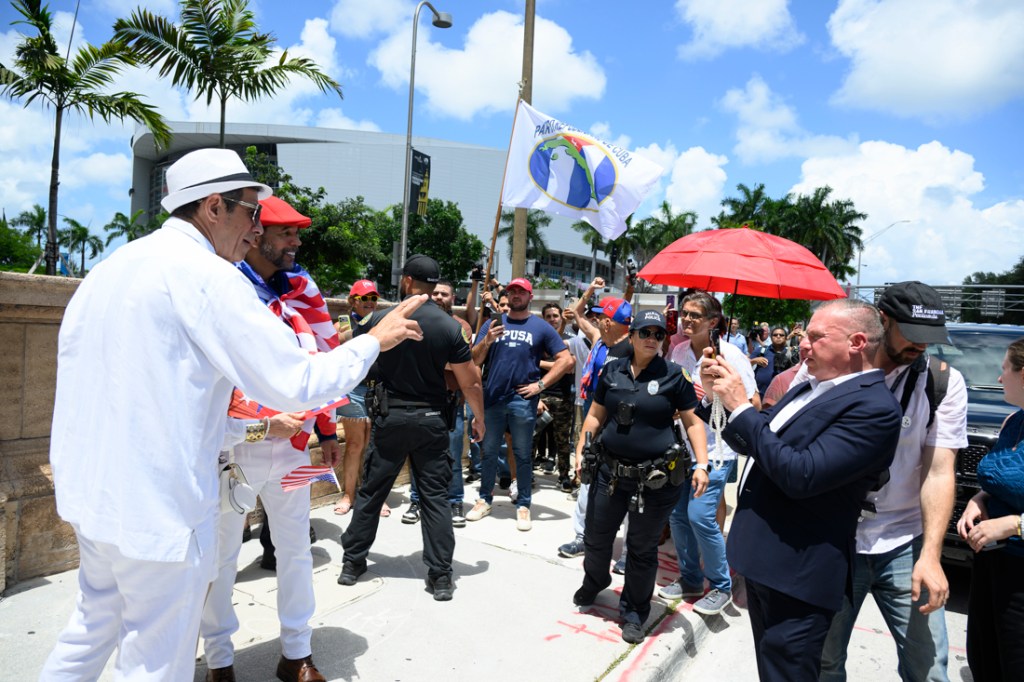 photo of protesters celebrating the indictment of Raul Castro on the streets of Miami