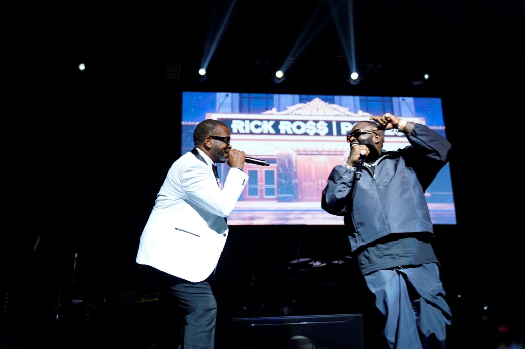 MIAMI, FLORIDA - MAY 29: (L-R) Luther Campbell and Rick Ross perform on stage during the "Rick Ross: Port Of Miami Orchestra Reunion Tour" at James L. Knight Center on May 29, 2026 in Miami, Florida. (Photo by Sergi Alexander/Getty Images)
