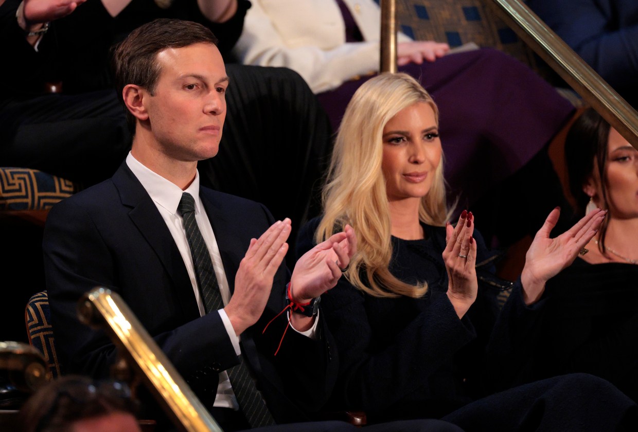 Jared Kushner and Ivanka Trump applaud among a crowd