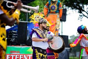 photo of a junkanoo band playing at an outdoor festival