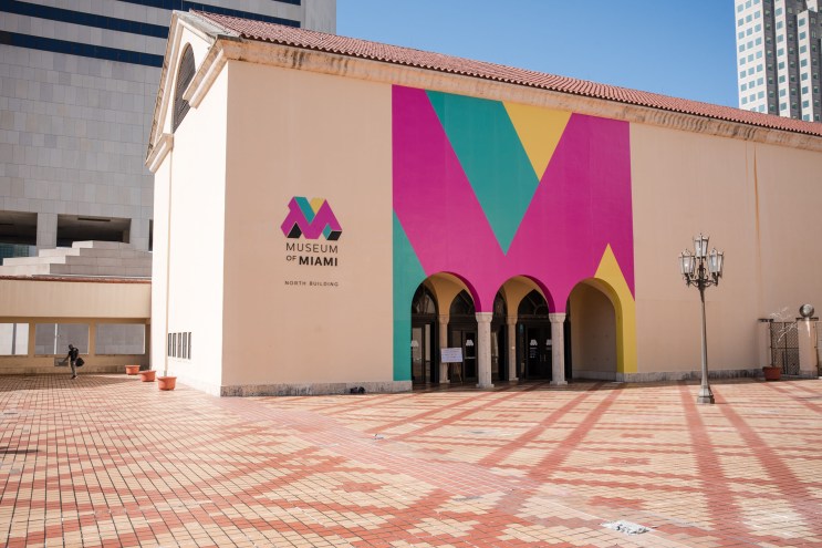 photo of the Museum of Miami's facade flanked by buildings in downtown Miami