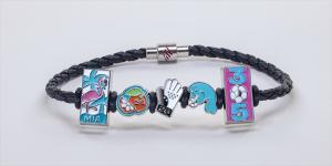 photo of a bracelet with charms depicting symbols related to the FIFA World Cup and Miami