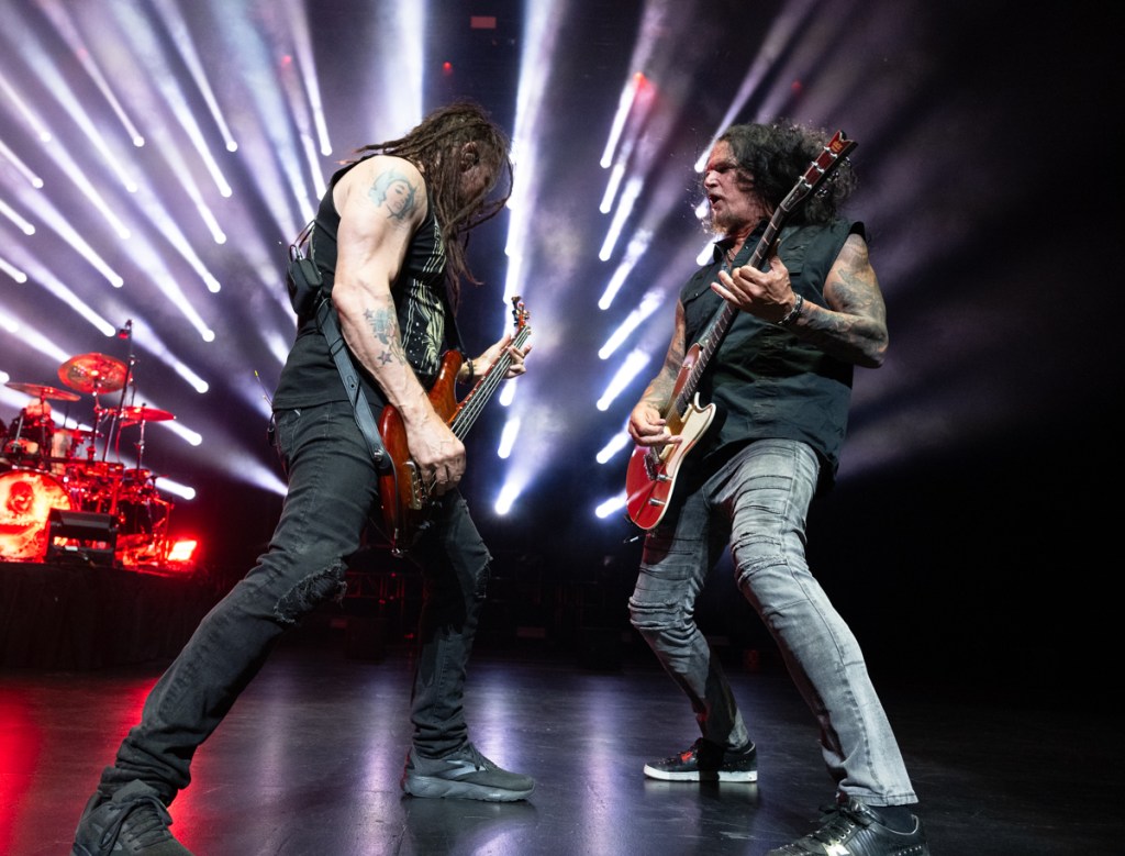Photo of Disturbed performing on stage at Hard Rock live