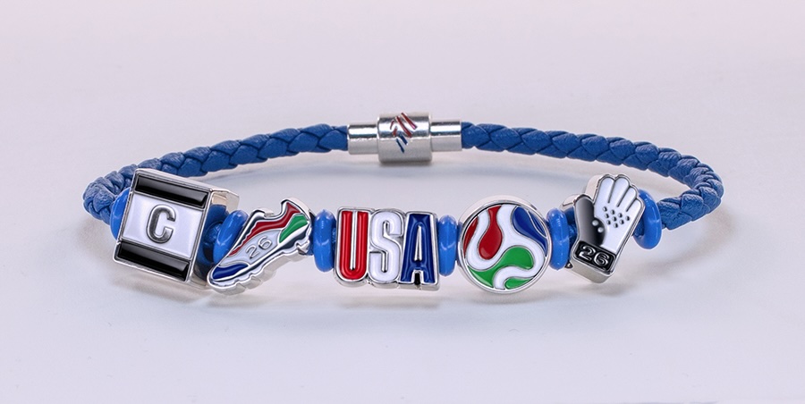 photo of a bracelet with charms depicting symbols related to the FIFA World Cup and U.S.