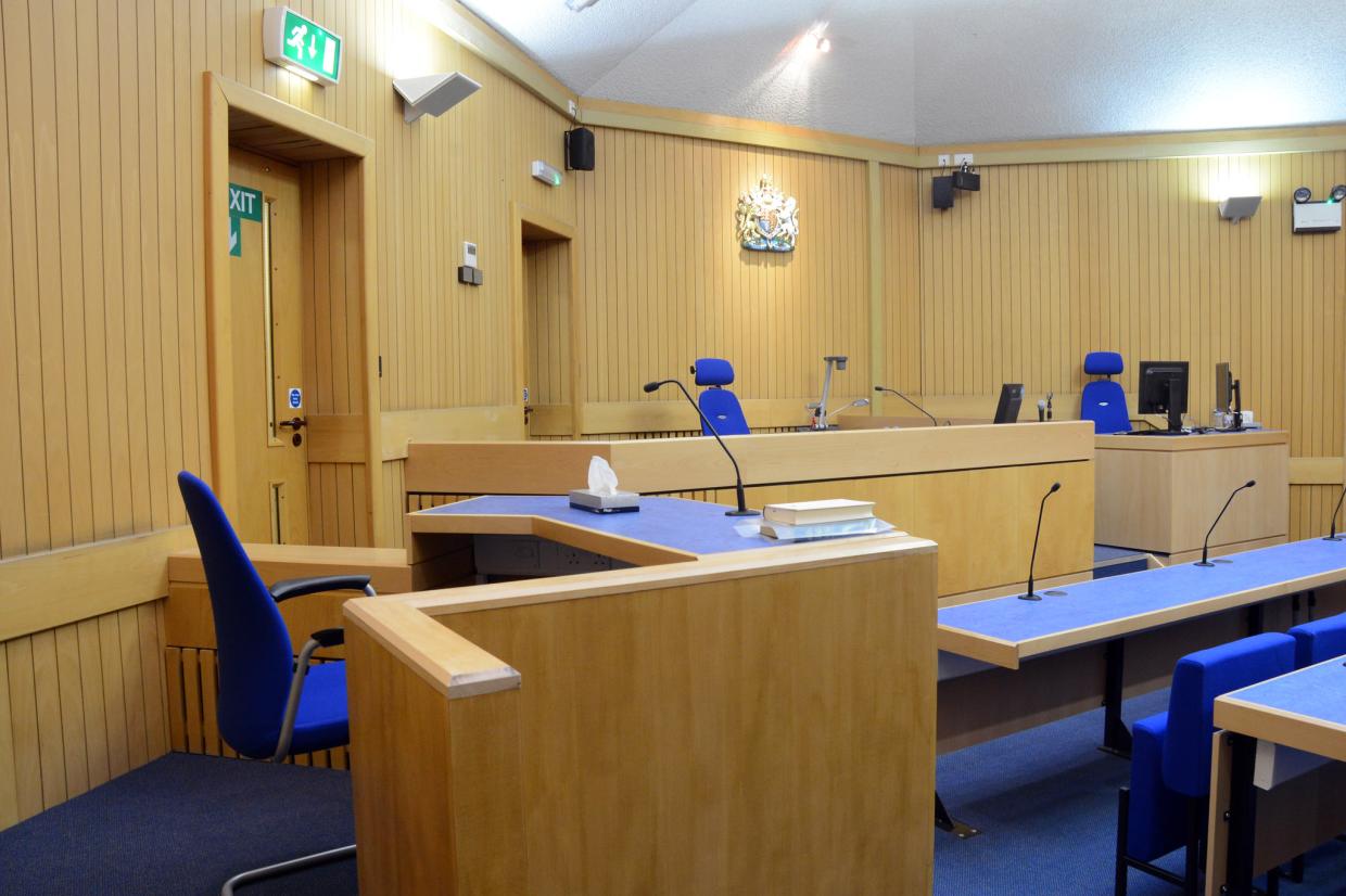 interior of a wooden and blue empty court room