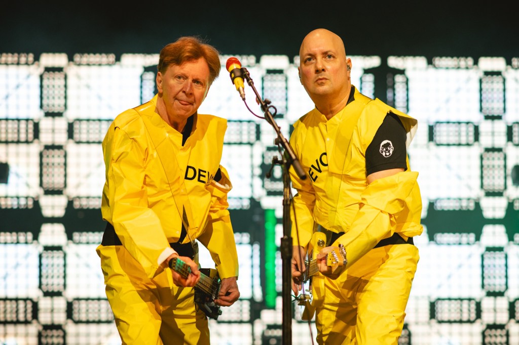 Photo of two Devo members performing in Miami