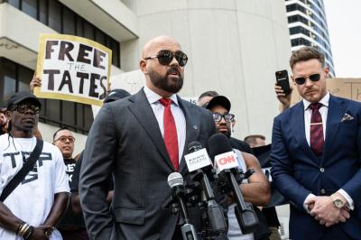 Miami's Tate protest featured pushups and patriots
