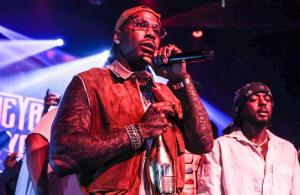 photo of rapper Moneybagg Yo onstage inside a club