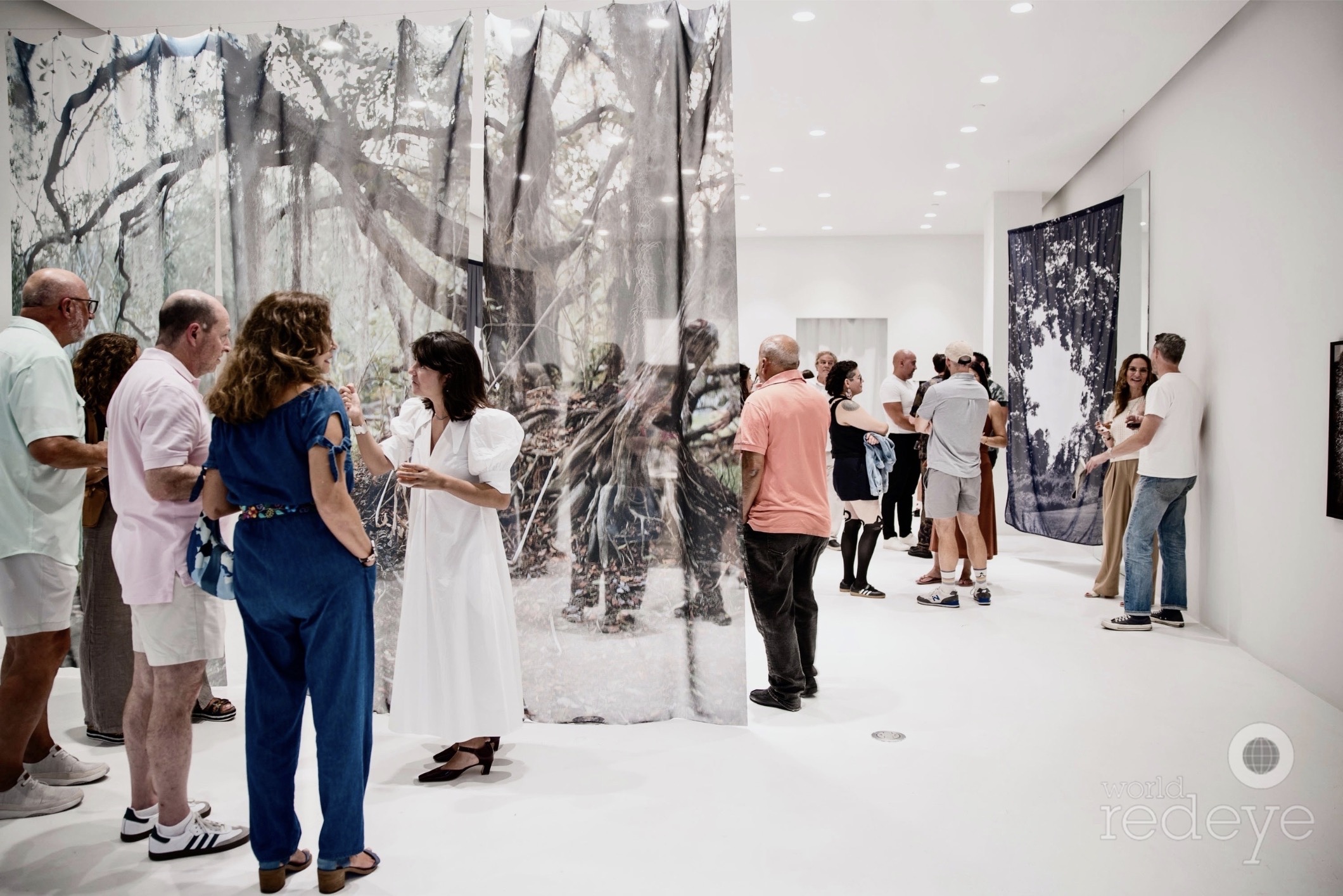 photo of a crowd at a gallery opening