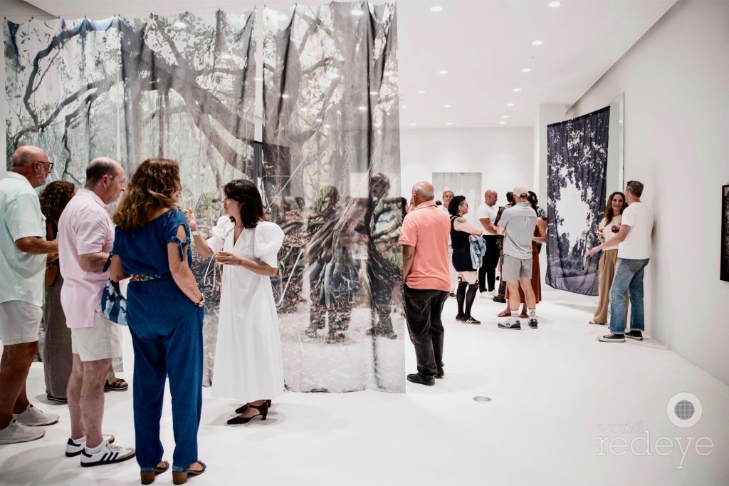 photo of a crowd at a gallery opening