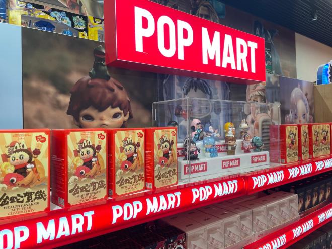 photo of boxed toys on the shelves at a Pop Mart store
