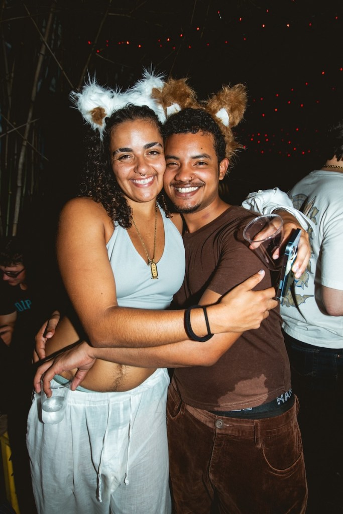 Photo of tow people wearing bear ears