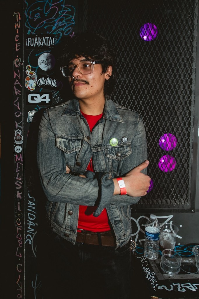Photo of a man wearing a denim jacket