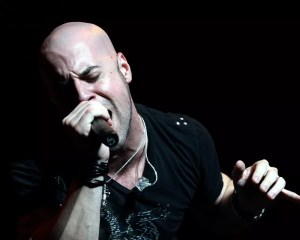 close-up photo of Daughtry singer Chris Daughtry singing into a microphone