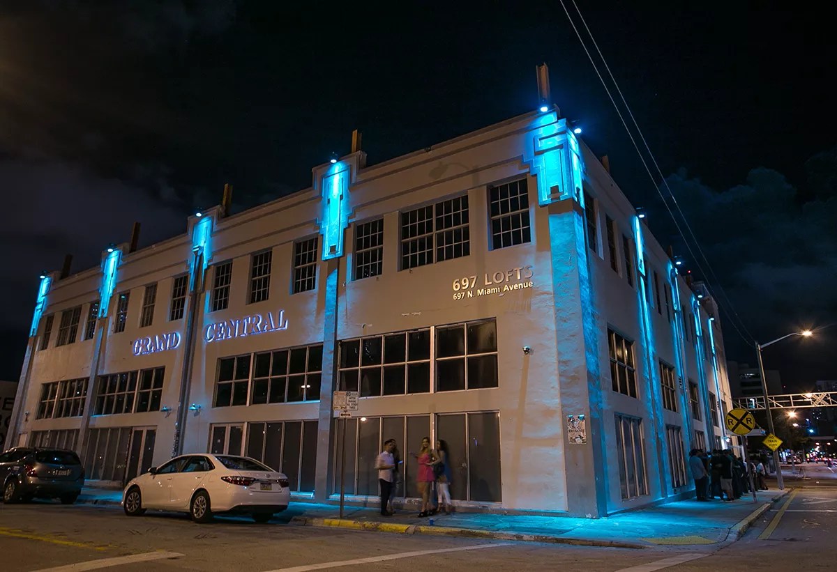 Photo of the outside of an industrial building with a sign that reads Grand Central.