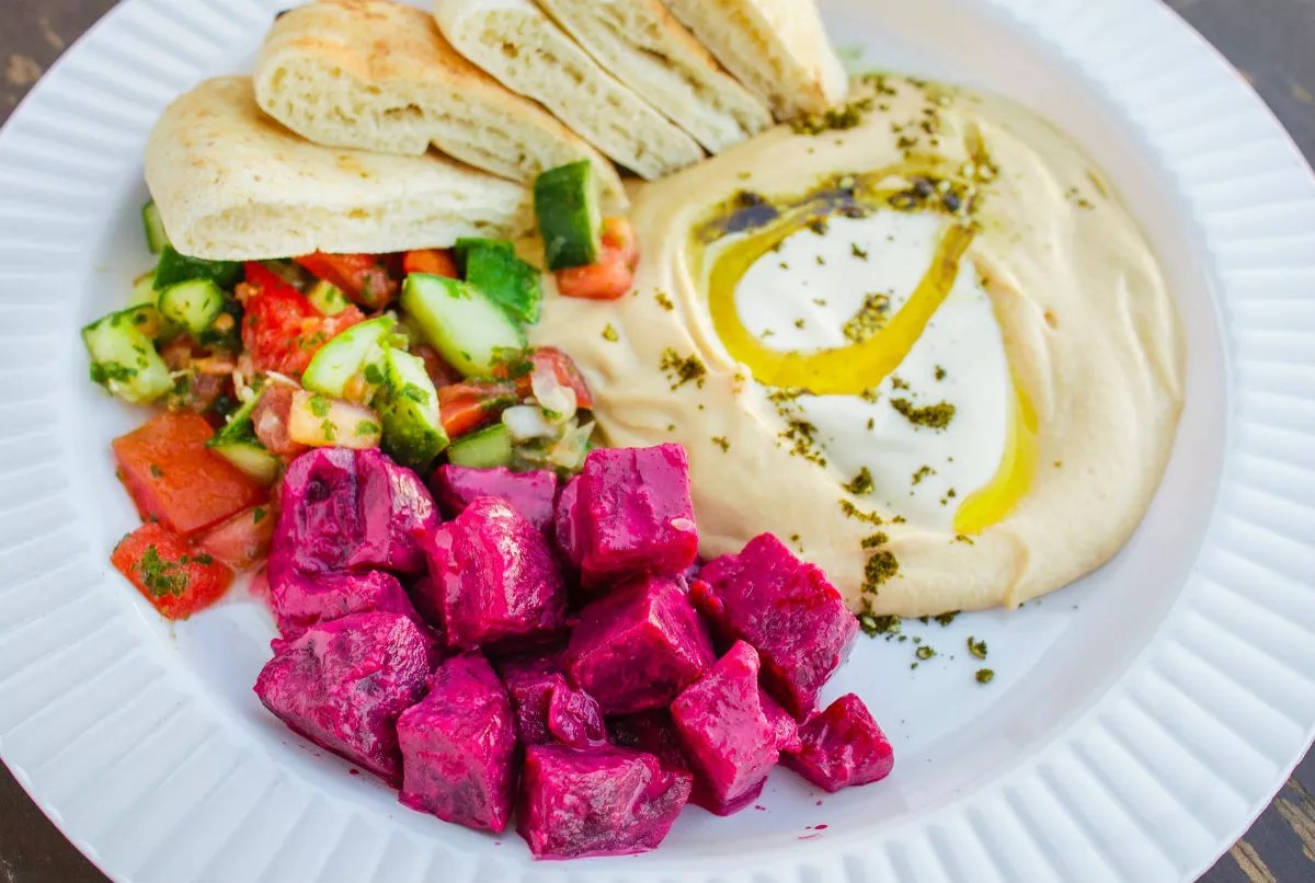 Wynwood Yard’s Vegan-Friendly Shnitz ‘n Fritz Transports You to Tel Aviv
