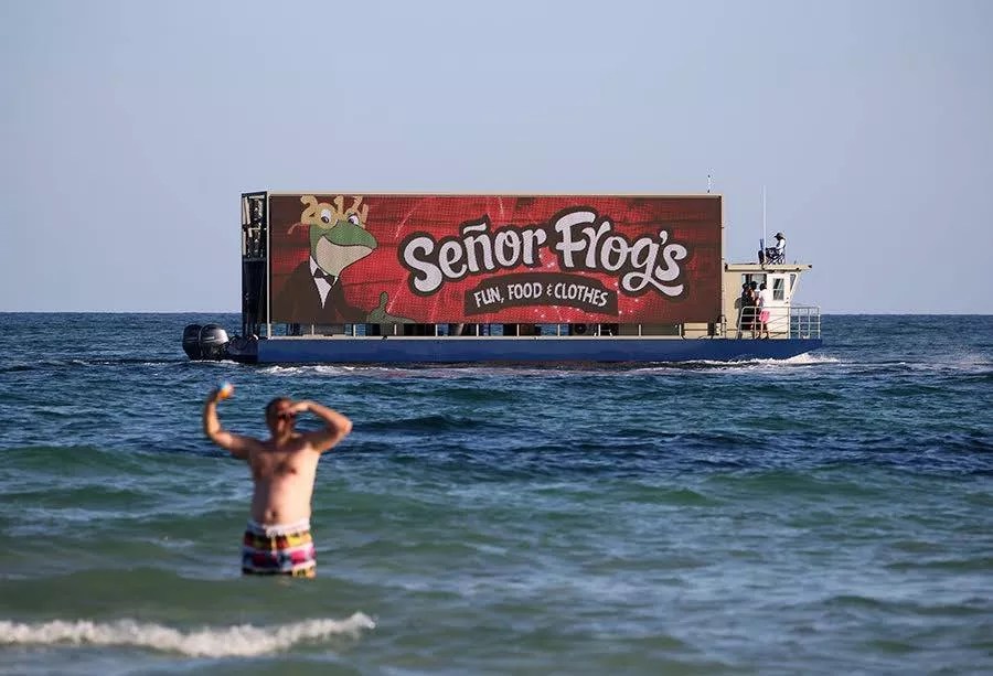 Miami Beach Tries to Ban Floating Billboards, But Company Says Law Can’t Touch Ocean Boats