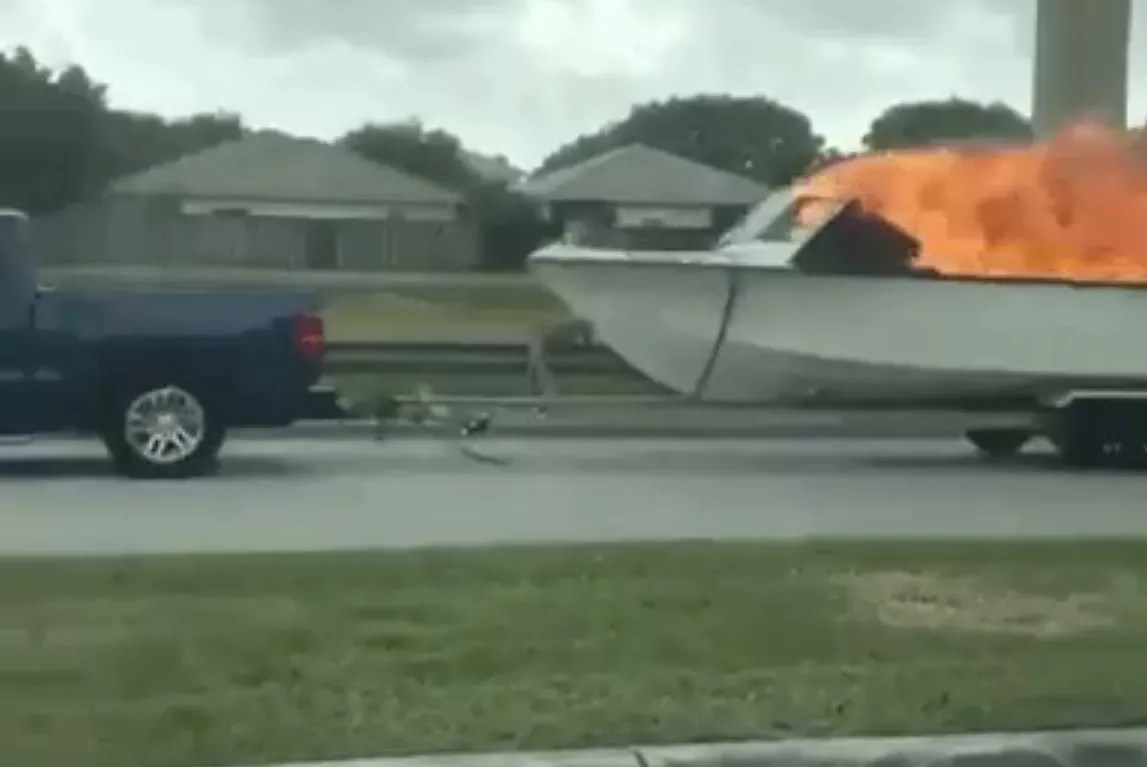 Here’s Video of Some Lunatic Towing a Flaming Boat on a Miami-Dade Highway